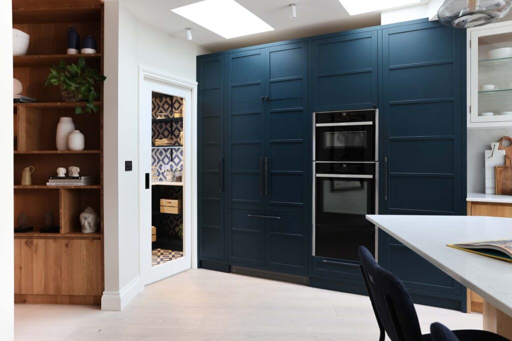 dark blue slim shaker kitchen / built in fridge / built in ovens /bespoke kitchen