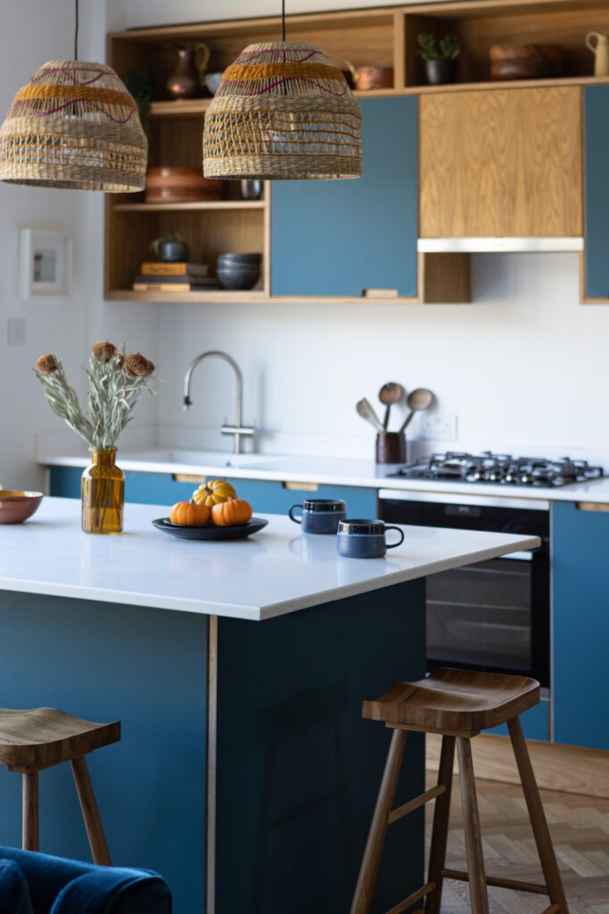 cut out handles/ blue and oak kitchen